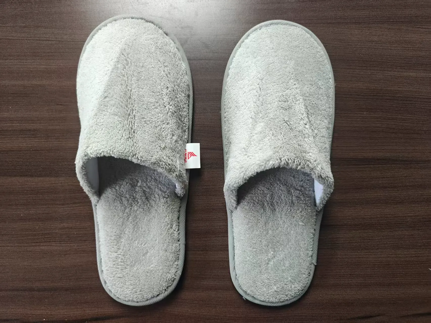 compact motel room disposable slippers USA bulk